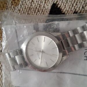 Michael Kors Silver Men's Watch Or Women's  Includes. COA. Needs Battery
